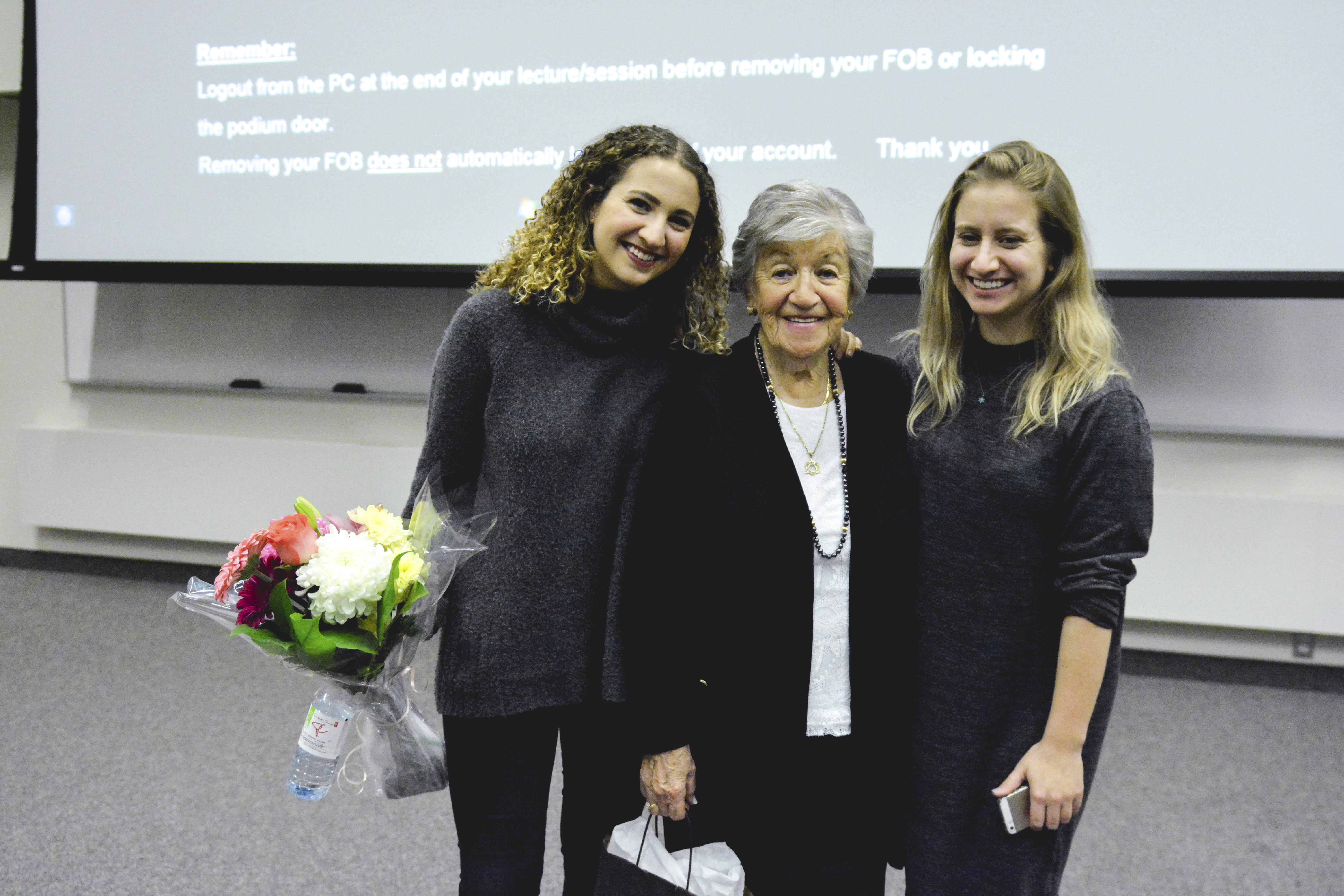 Holocaust survivor Paula Goldhar (middle) with her granddaughters Dayna Goldhar (left) and Eli Goldhar (right). Photo by Ju Hyun Kim