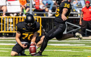Evan Astolfo #36 of the Warriors kicks a field goal. (courtesy:UWAthletics)