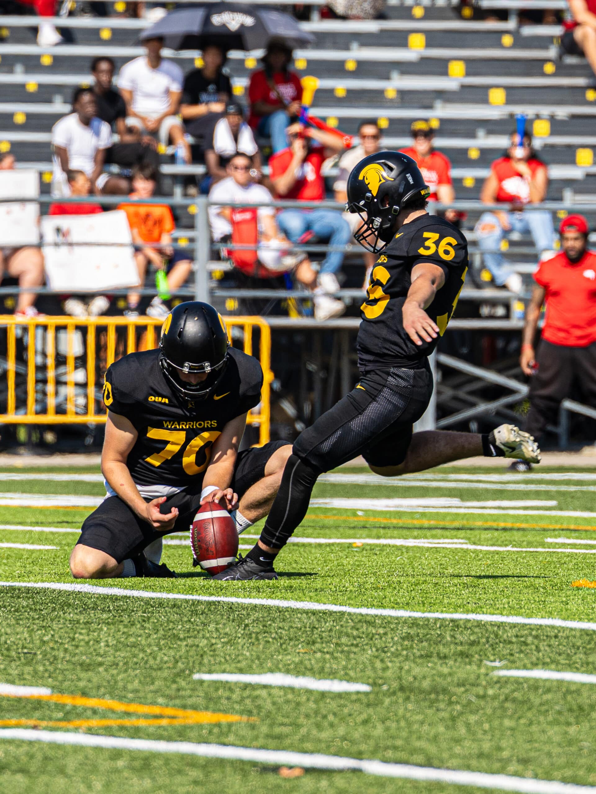 Evan Astolfo #36 of the Warriors kicks a field goal. (courtesy:UWAthletics)
